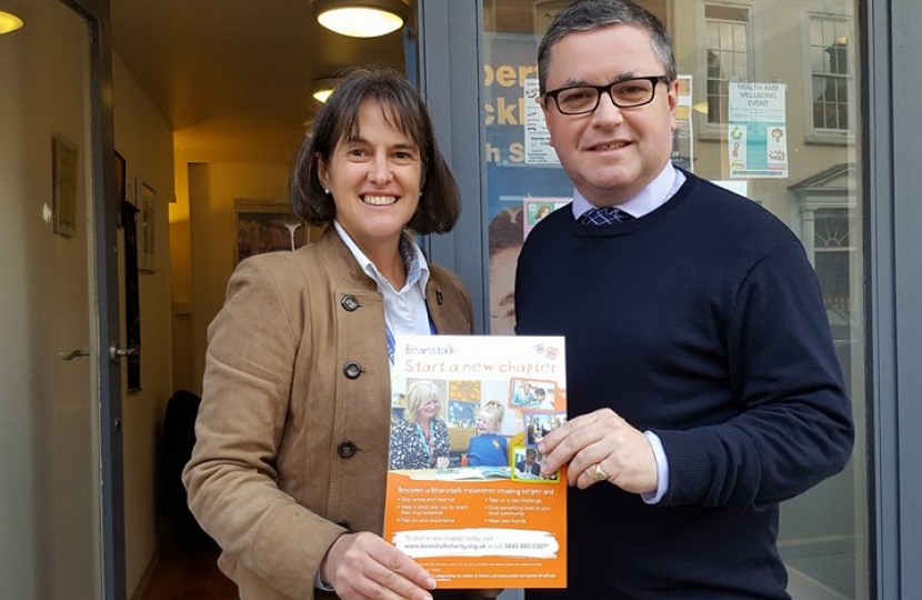 Robert Buckland MP pictured with Amelia Shaw from Beanstalk