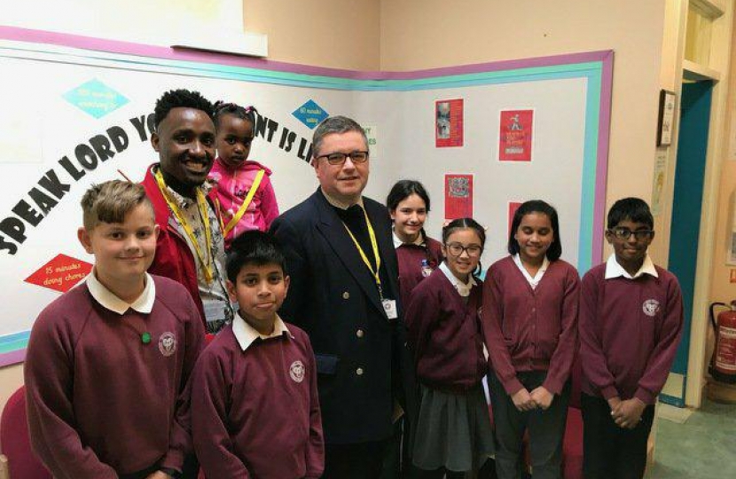 Robert Buckland MP pictured with children from Holy Family Primary School in Swindon