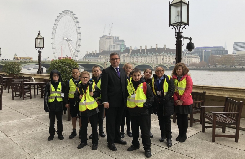 Robert Buckland MP pictured with Year 6 pupils at Peatmoor Community Primary School during their visit to Parliament