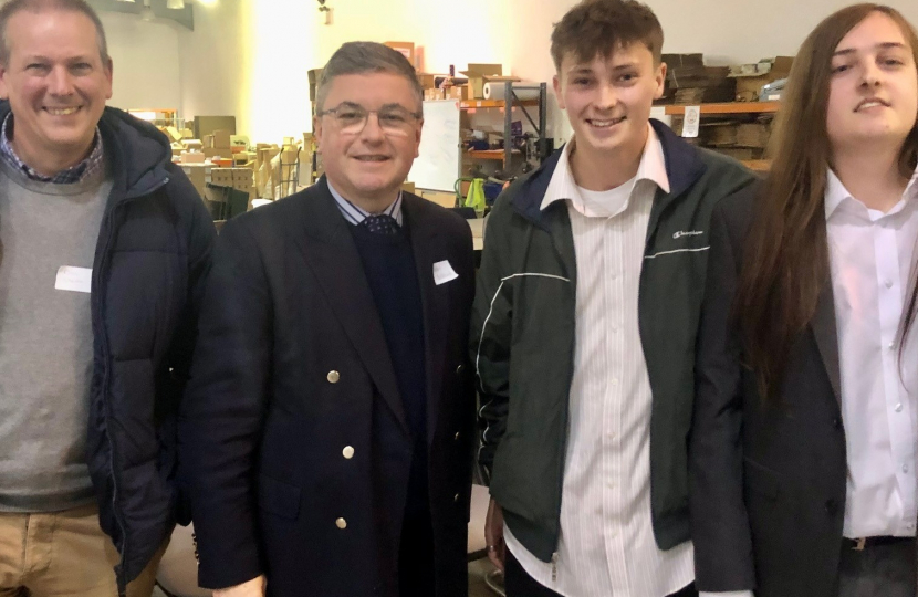 The Rt Hon Robert Buckland QC MP photographed with Service Users at Phoenix Enterprises