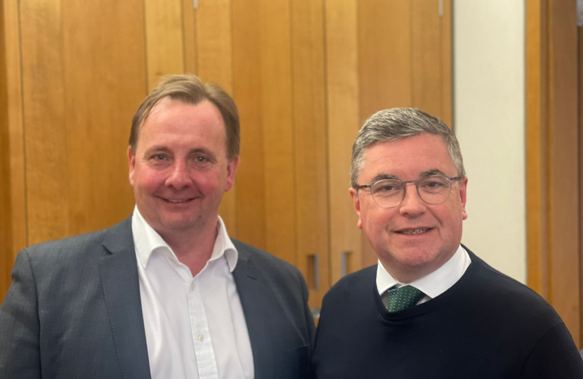 Sir Robert Buckland KBE KC MP pictured with Mountain Warehouse Founder and CEO Mark Neale