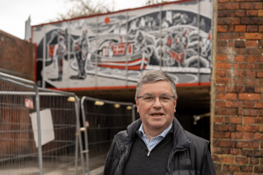 Sir Robert Buckland MP with the new Conservative Government Funded  mural showcasing Swindon’s canal history 